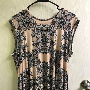 Rose and olive sleeveless blouse.